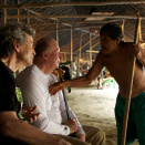 The director of the Rainforest Foundation Norway, Dag Hareide, and King Harald listen to the medicine man Lorival, who is recounting the history and way of life of the Yanomami (Photo: Rainforest Foundation Norway / ISA Brazil)